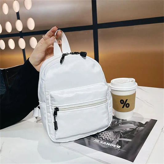 Ddbos Korean Nylon holographic backpack Women Casual Solid Color Small Schoolbag Travel Bag For Teenager Student School Bag Back